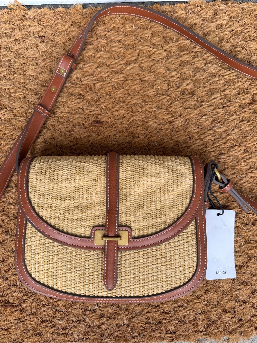Mango Straw Crossbody Bag with Brown Trim and woven raffia